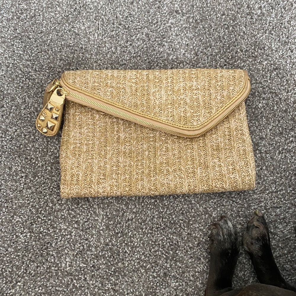 Gold convertible Henri bendel clutch